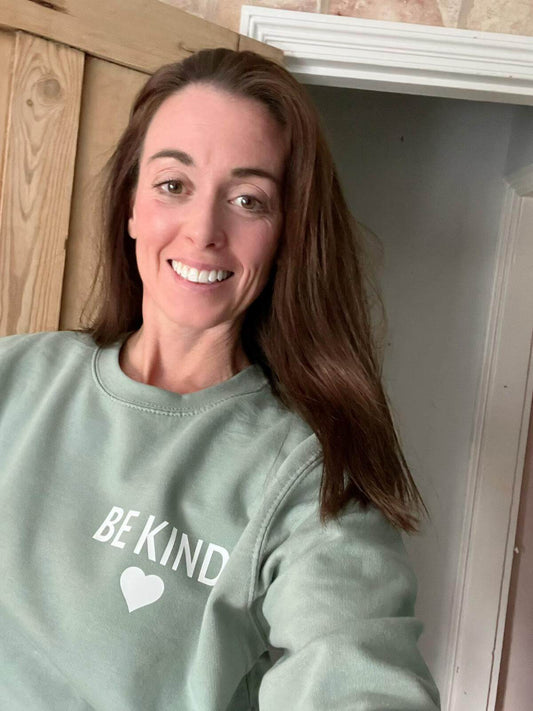 Crew neck sweater with Be Kind design