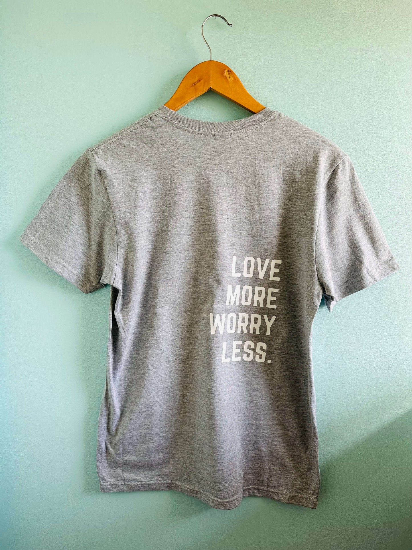 Grey crew neck T-shirt with Love more worry less design
