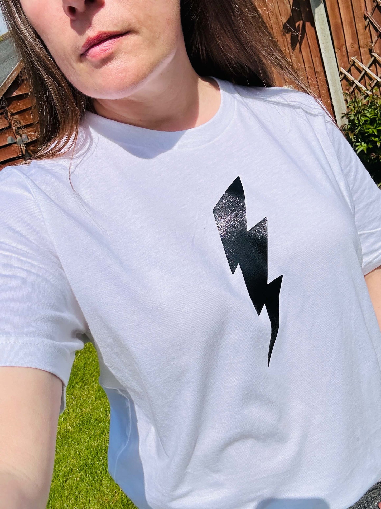 Unisex white T-shirt with black lightning bolt design